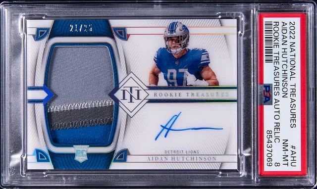 2022 Panini National Treasures Aidan Hutchinson Treasures Autograph Relic #AHU card image