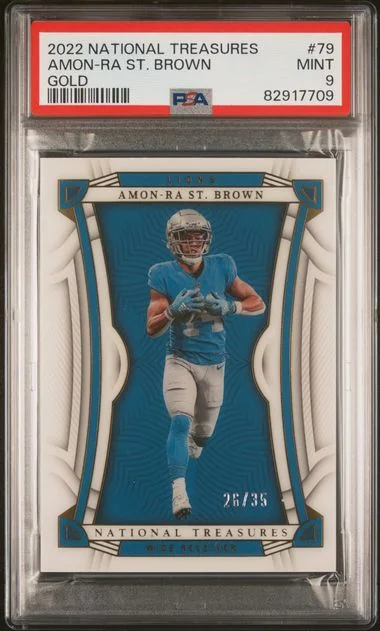 2022 Panini National Treasures Amon-Ra St. Brown Gold #79 card image