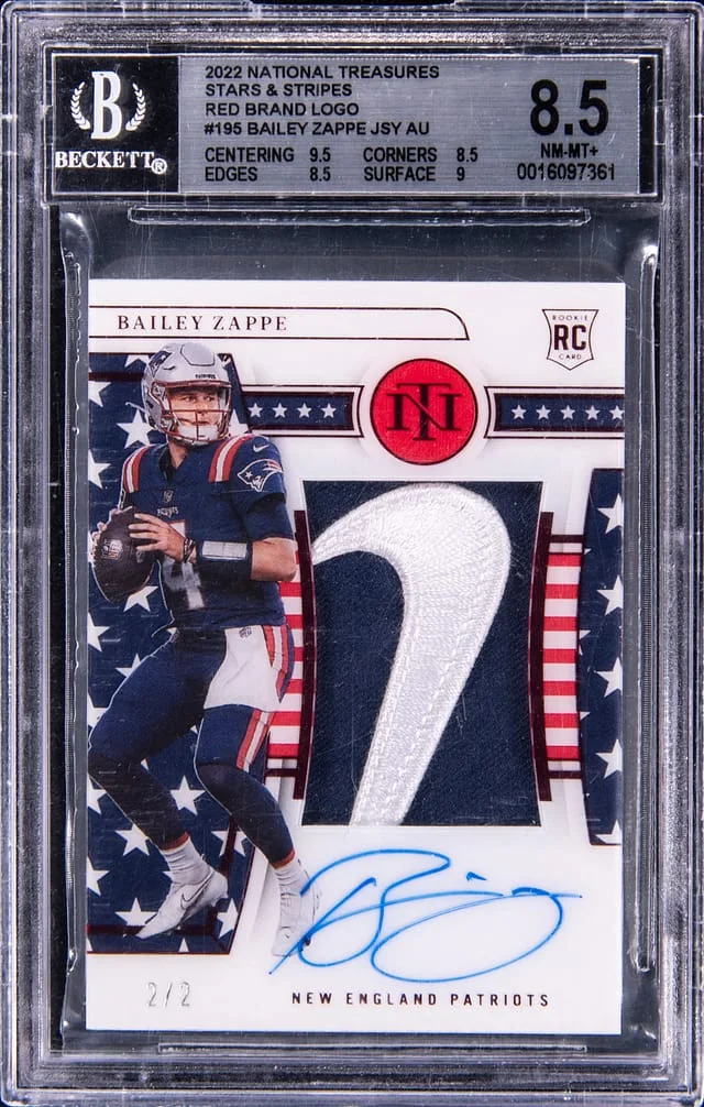 2022 Panini National Treasures Bailey Zappe Patch Autograph (RPA) Stars & Stripes Red Brand Logo #195 card image