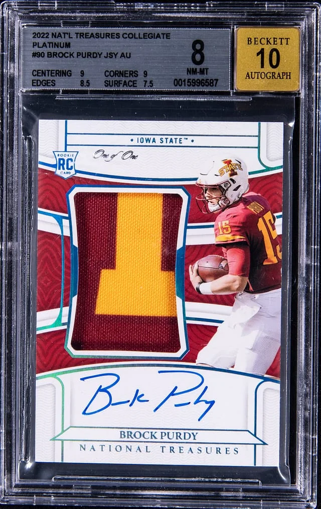 2022 Panini National Treasures Brock Purdy Collegiate Patch Autograph (RPA) Platinum #90 card image