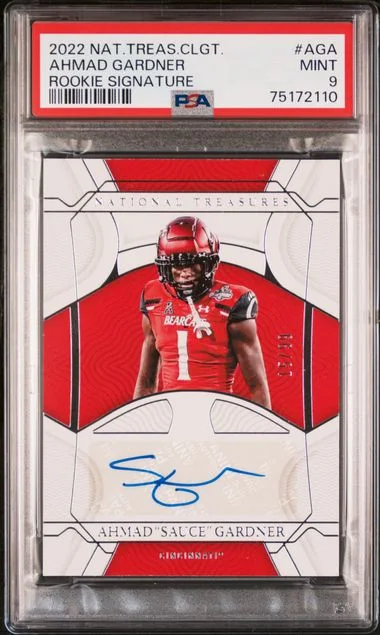 2022 Panini National Treasures Collegiate Signatures Aga Ahmad Sauce Gardner #no-number card image