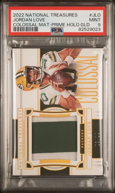 2022 Panini National Treasures Colossal Materials Prime Holo Gold Jlo Jordan Love #no-number card image