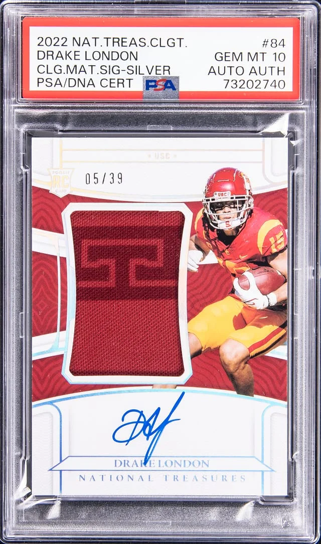 2022 Panini National Treasures Drake London Collegiate Materials Signatures Silver #84 card image