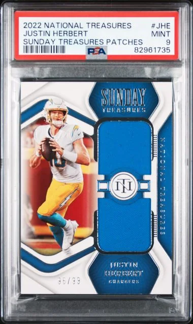 2022 Panini National Treasures Justin Herbert Sunday Treasures Patches #JHE card image