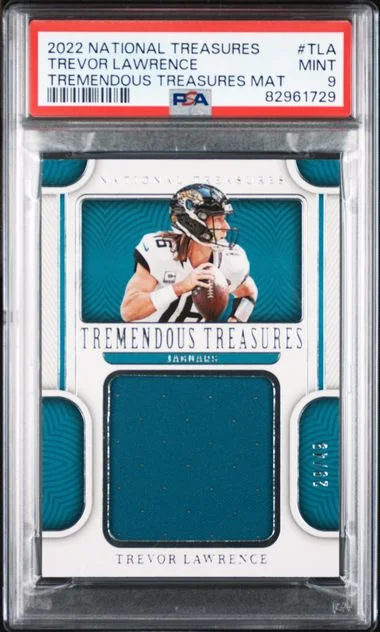 2022 Panini National Treasures Tremendous Treasures Material Tla Trevor Lawrence #no-number card image