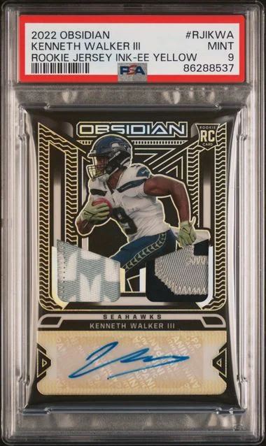 2022 Panini Obsidian Kenneth Walker III Jersey Ink Electric Etch Yellow #RJIKWA card image