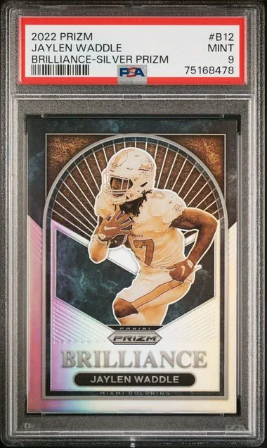 2022 Panini Prizm Jaylen Waddle Brilliance Silver Prizm #B12 card image