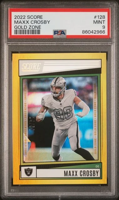 2022 Panini Score Maxx Crosby Gold Zone #128 card image