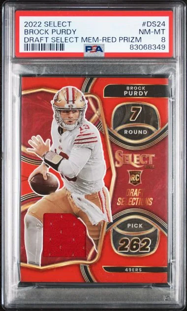 2022 Panini Select Brock Purdy Draft Selections Memorabilia Red Prizm #DS24 card image