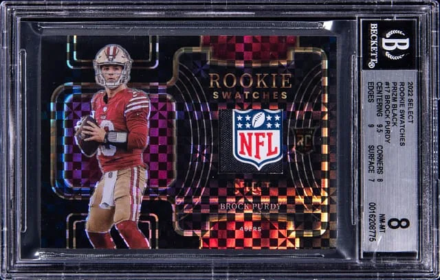 2022 Panini Select Brock Purdy NFL Shield Swatches Black Prizm #RSW-17 card image