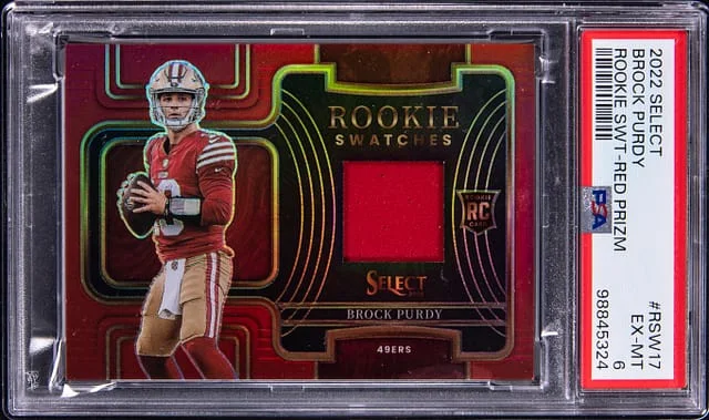 2022 Panini Select Brock Purdy Swatches Red Prizm #RSW-17 card image