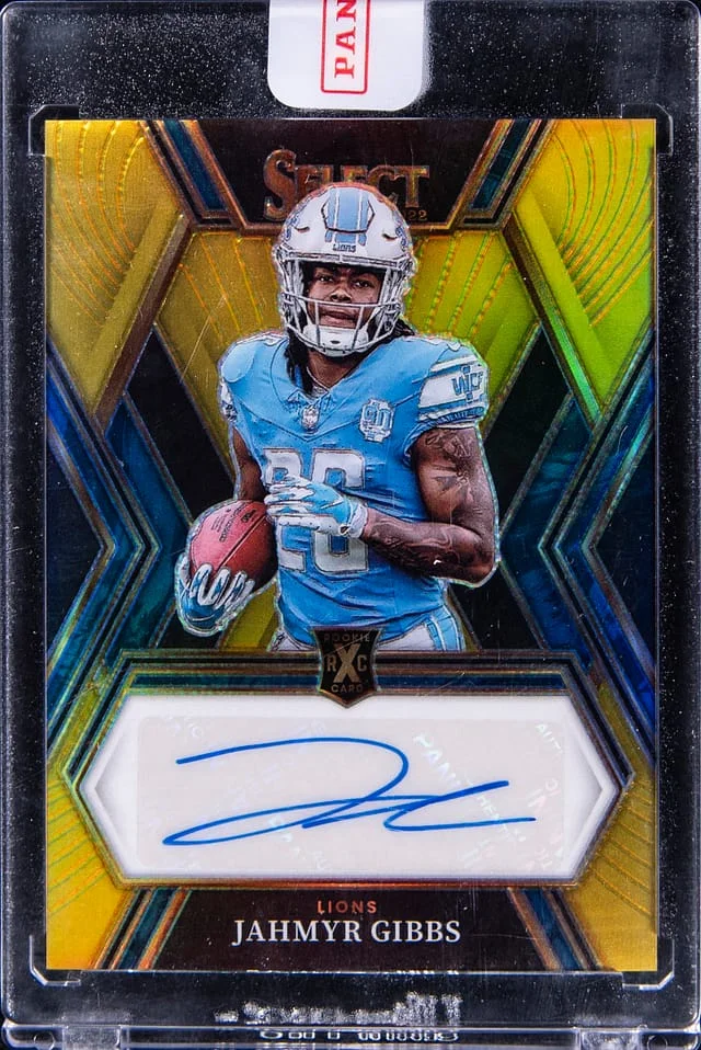 2022 Panini Select Jahmyr Gibbs 23 Select XRC Prizm Mystery Autograph Redemption Gold Prizm #XRC-JG card image