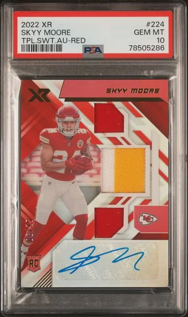 2022 Panini Skyy Moore XR Triple Swatch Autographs Red #224 card image