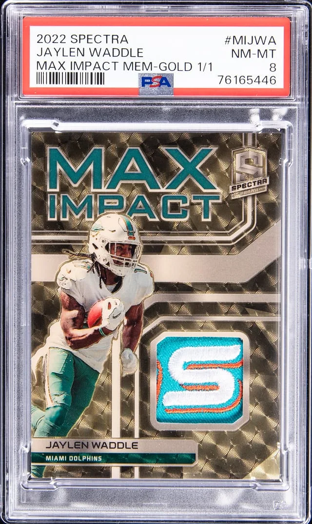 2022 Panini Spectra Jaylen Waddle Max Impact Memorabilia Gold #MIJWA card image