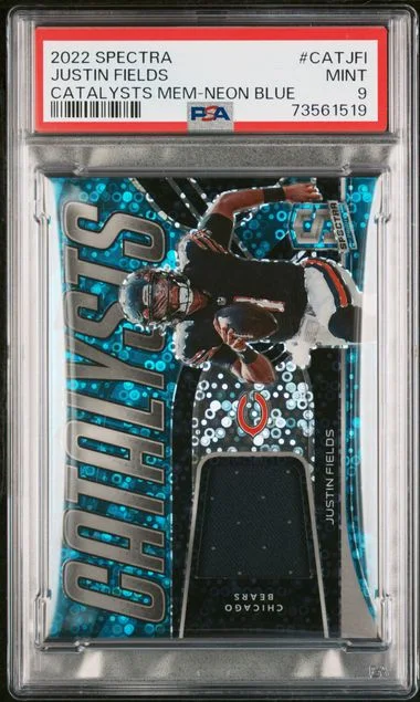 2022 Panini Spectra Justin Fields Catalysts Memorabilia Neon Blue #CAT-JFI card image