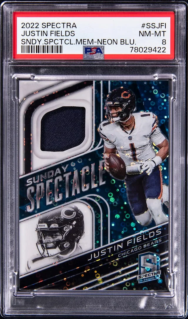 2022 Panini Spectra Justin Fields Sunday Spectacle Memorabilia Neon Blue #SSJFI card image
