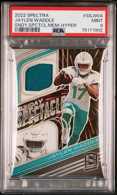 2022 Panini Spectra Sunday Spectacle Memorabilia Hyper Ssjwa Jaylen Waddle #no-number card image