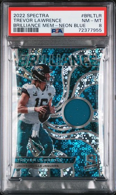 2022 Panini Spectra Trevor Lawrence Brilliance Memorabilia Neon Blue #BRL-TLR card image
