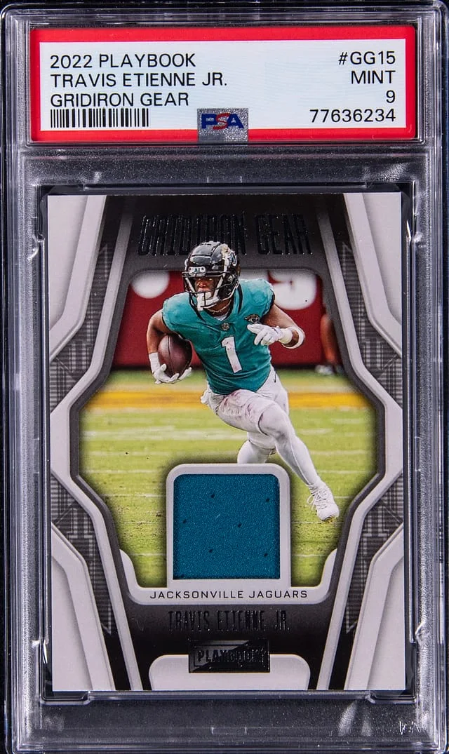 2022 Panini Travis Etienne Jr. Playbook Gridiron Gear #GG15 card image