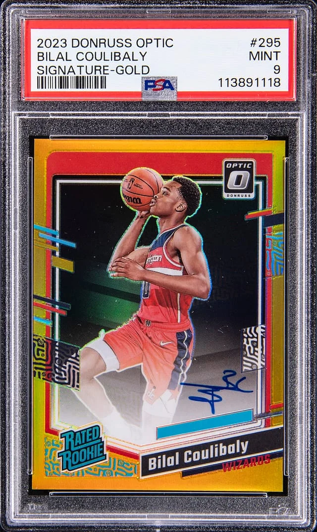 2023-24 Panini Donruss Optic Bilal Coulibaly Signature Gold #295 card image