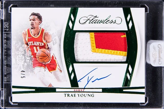 2023-24 Panini Flawless Trae Young Horizontal Patch Autograph Emerald #HPA-TYA card image