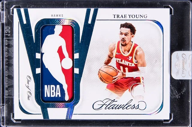 2023-24 Panini Flawless Trae Young Logoman #LM-TYG card image