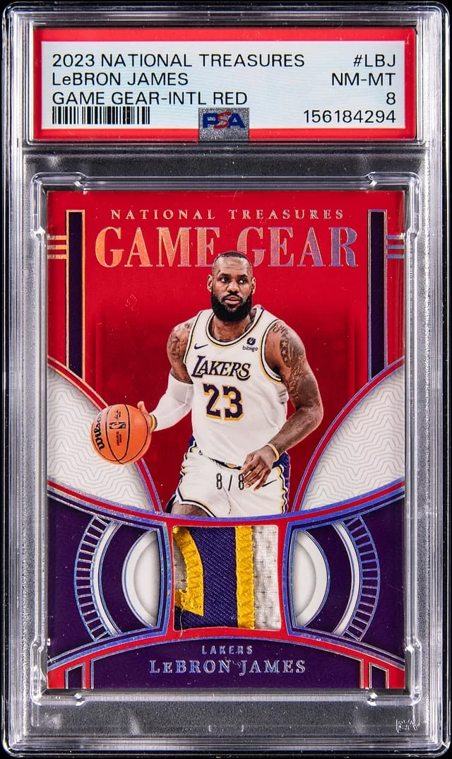 2023-24 Panini National Treasures LeBron James Game Gear International Red #GG-LBJ card image