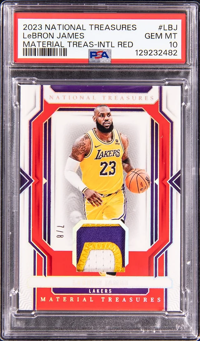 2023-24 Panini National Treasures LeBron James Material Treasures International Red #MT-LBJ card image