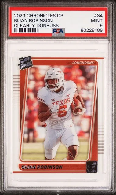 2023 Panini Chronicles Draft Picks Bijan Robinson Clearly Donruss #34 card image