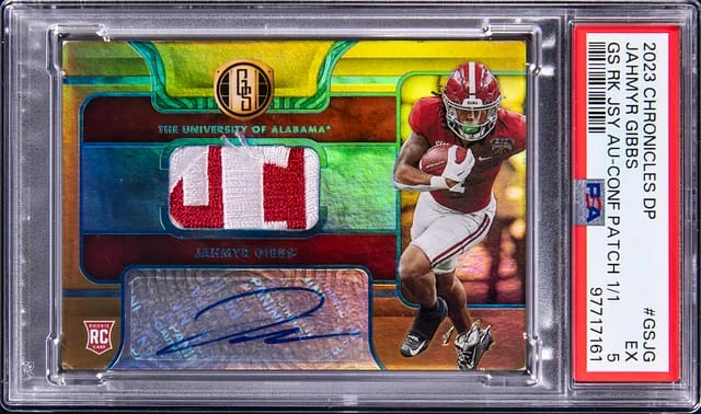 2023 Panini Chronicles Draft Picks Jahmyr Gibbs Gold Standard Jersey Autograph Conference Patch #GS-JG card image