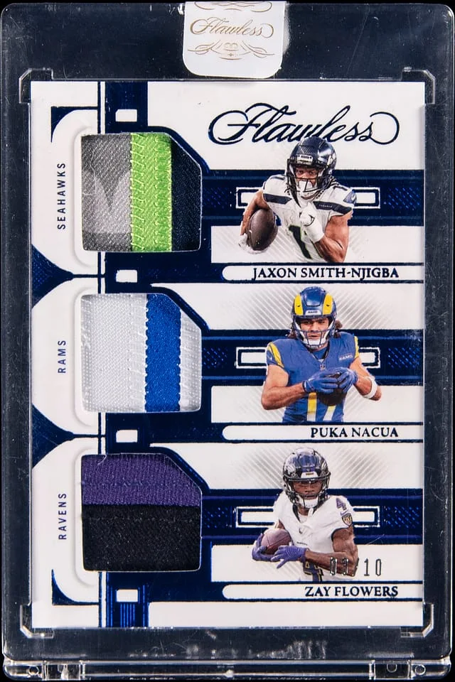 2023 Panini Flawless Jaxon Smith-Njigba/Puka Nacua/Zay Flowers Multi-Patch Card - Panini Encased Triple Patches #TP-WR1 card image