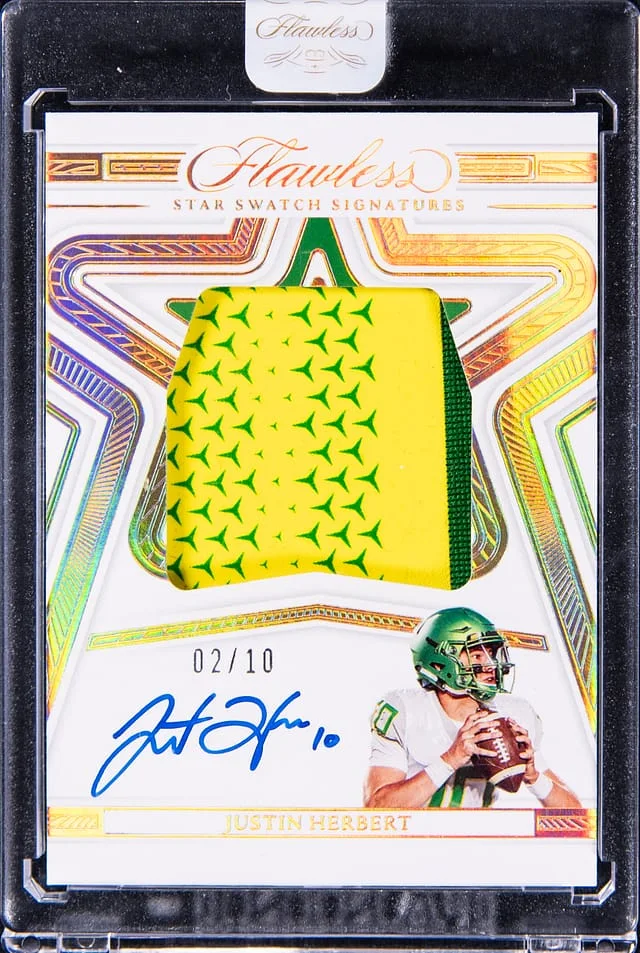 2023 Panini Flawless Justin Herbert Collegiate Star Swatch Signatures Gold #SSS-JHE card image