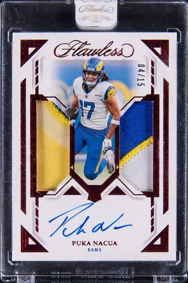 2023 Panini Flawless Puka Nacua Dual Patch Autographs Ruby #DPA-PNA card image