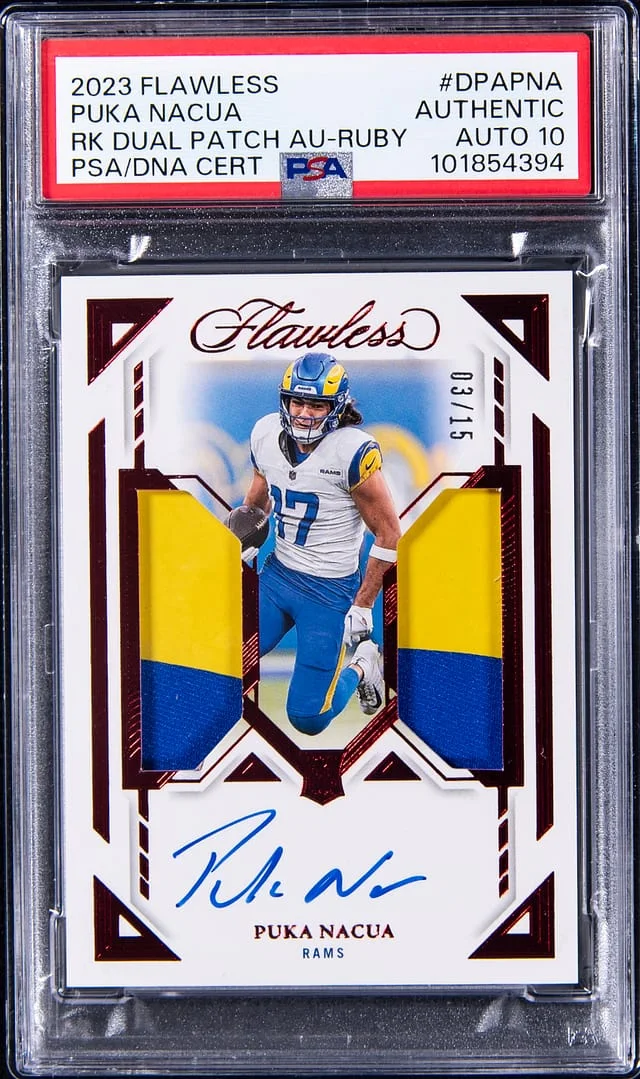 2023 Panini Flawless Puka Nacua Dual Patch Autograph Ruby #DPAPNA card image