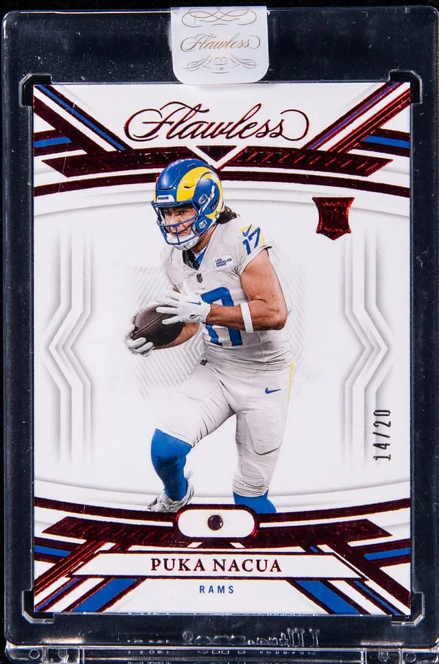 2023 Panini Flawless Puka Nacua Ruby Relic - Panini Encased #108 card image