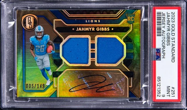 2023 Panini Gold Standard Jahmyr Gibbs Jersey Autograph #251 card image