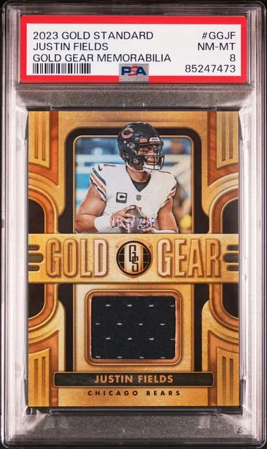 2023 Panini Gold Standard Justin Fields Gold Gear Memorabilia #GG-JF card image