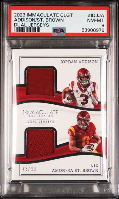 2023 Panini Immaculate Amon-Ra St. Brown/Jordan Addison Collegiate Immaculate Dual Jerseys #IDJ-JA card image