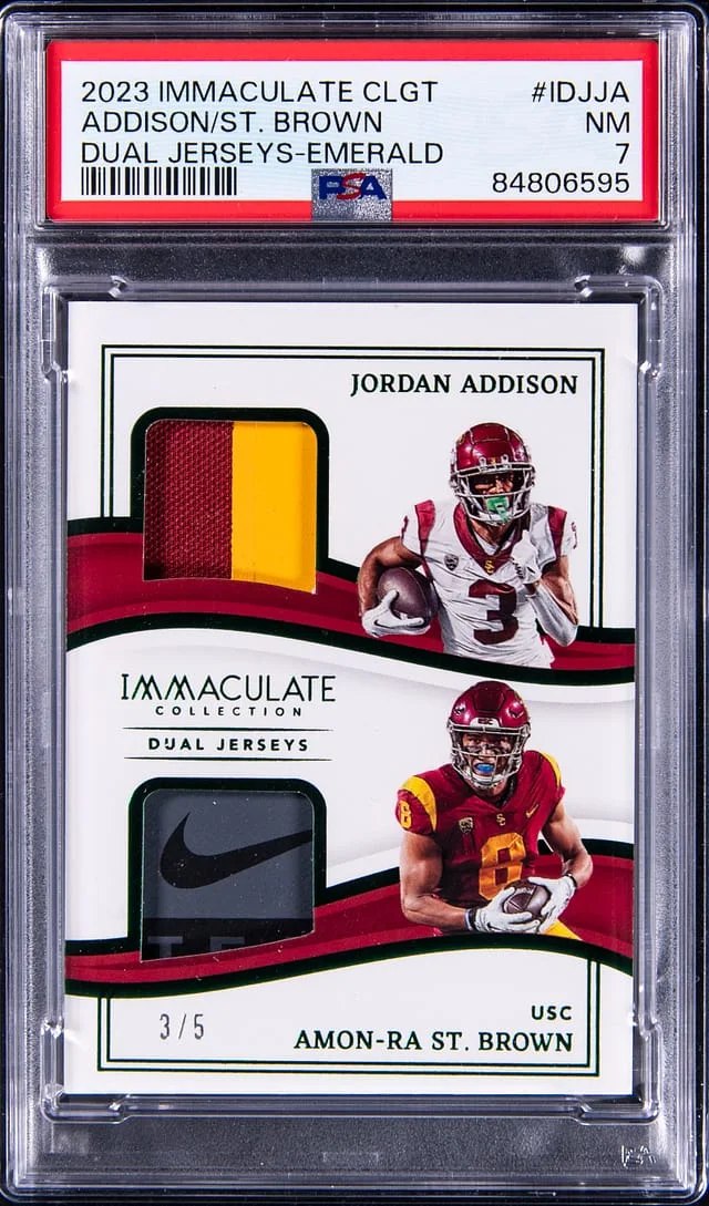 2023 Panini Immaculate Jordan Addison/Amon-Ra St. Brown Collegiate Dual Jerseys Emerald #IDJ-JA card image