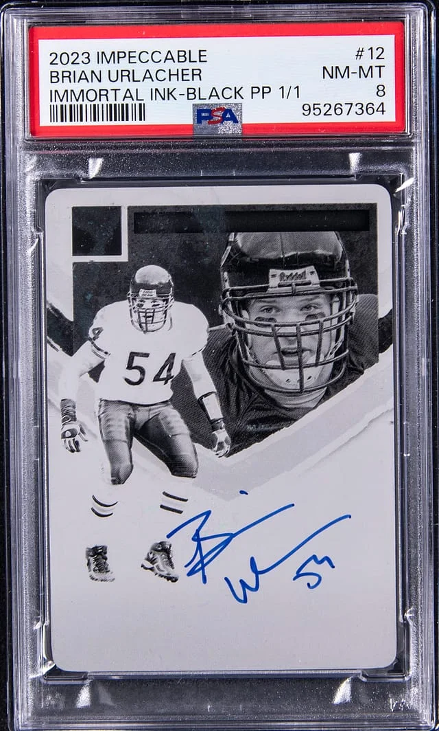2023 Panini Impeccable Brian Urlacher Immortal Ink Black Printing Plate #12 card image