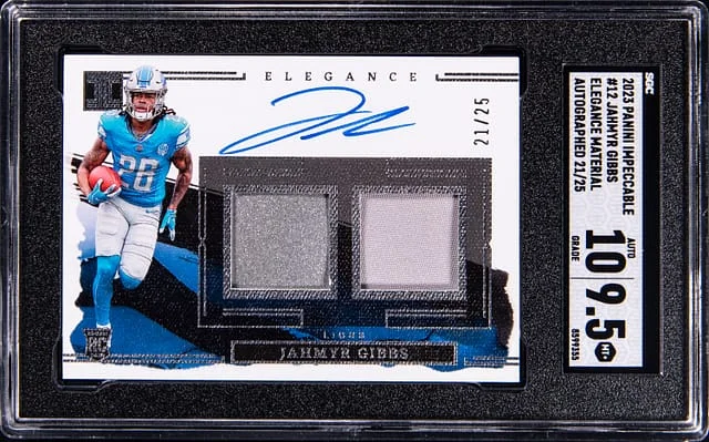 2023 Panini Impeccable Jahmyr Gibbs Elegance Silver Bar Autograph Ruby #12 card image
