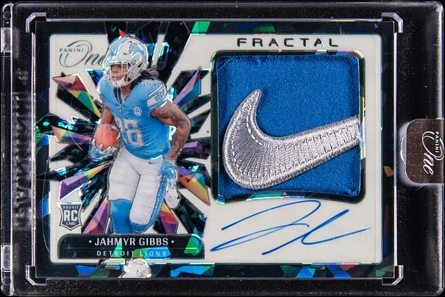 2023 Panini Jahmyr Gibbs One Fractal Patch Autographs Brand Logo #385 card image