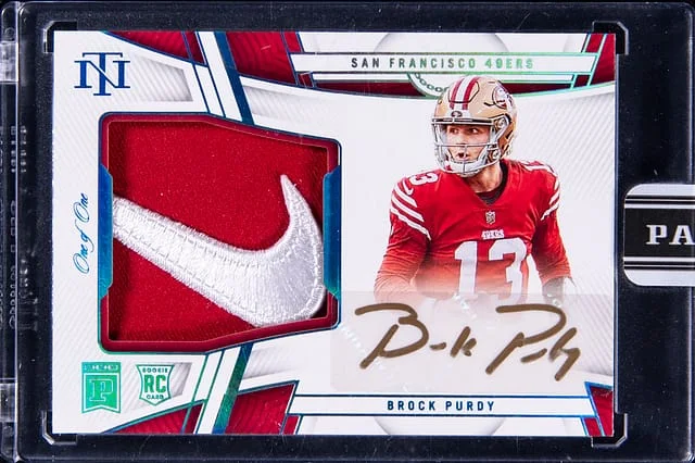 2023 Panini National Treasures Brock Purdy Blockchain Patch Autograph (RPA) Nike Swoosh #NPA-BP card image