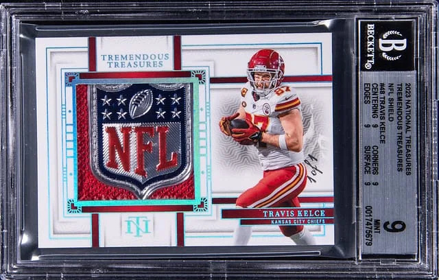2023 Panini National Treasures Travis Kelce Tremendous Treasures NFL Shield #TRE-TKE card image