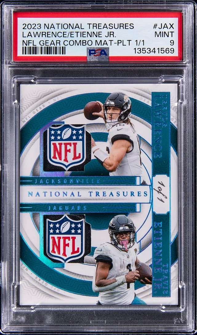 2023 Panini National Treasures Trevor Lawrence/Travis Etienne Jr. NFL Gear Combo Materials Platinum #GCM-JAX card image