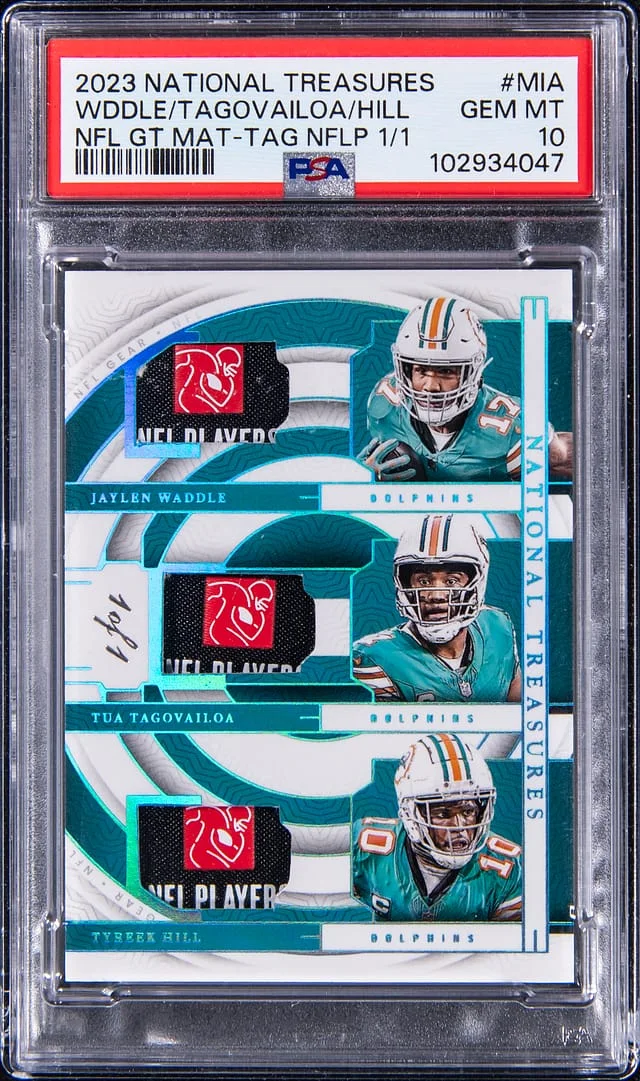 2023 Panini National Treasures Tua Tagovailoa/Jaylen Waddle/Tyreek Hill NFL Gear Trio Materials NFL Players Laundry Tags #GTM-MIA card image