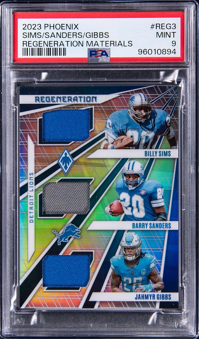 2023 Panini Phoenix Regeneration Materials Billy Sims/Barry Sanders/Jahmyr Gibbs #no-number card image