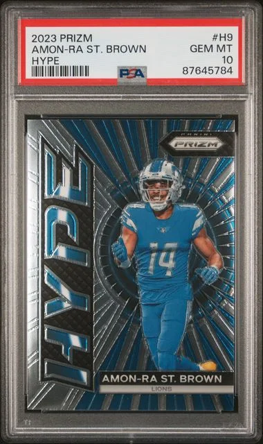 2023 Panini Prizm Amon-Ra St. Brown Hype #H9 card image