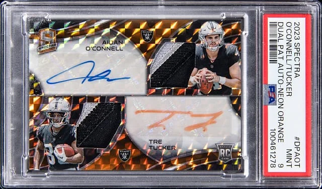 2023 Panini Spectra Aidan O'Connell/Tre Tucker Dual Patch Autograph Neon Orange #DPAOT card image