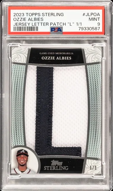 2023 Topps Sterling Ozzie Albies Game-Used Jersey Letter Patch L #JLP-OA card image